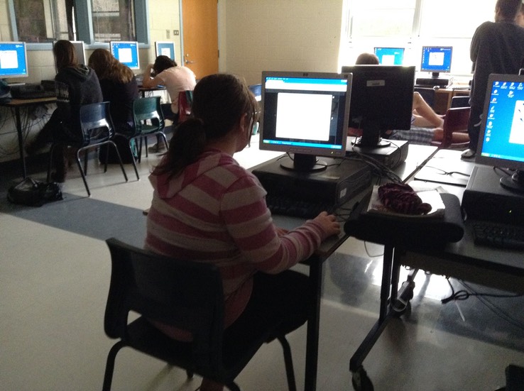 students using computers in the classroom